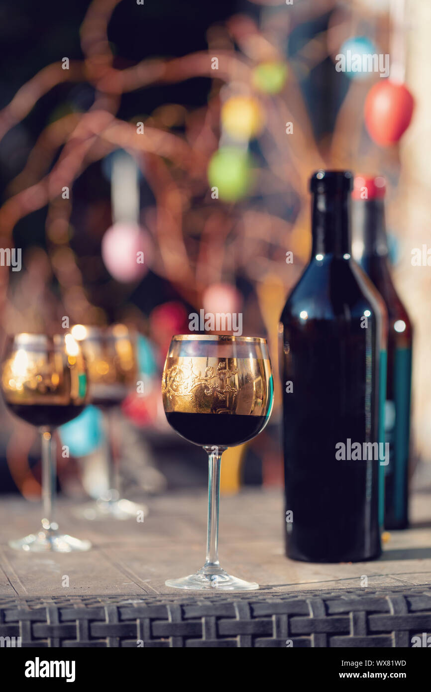 Bottle of vine, glass and easter eggs Stock Photo Alamy