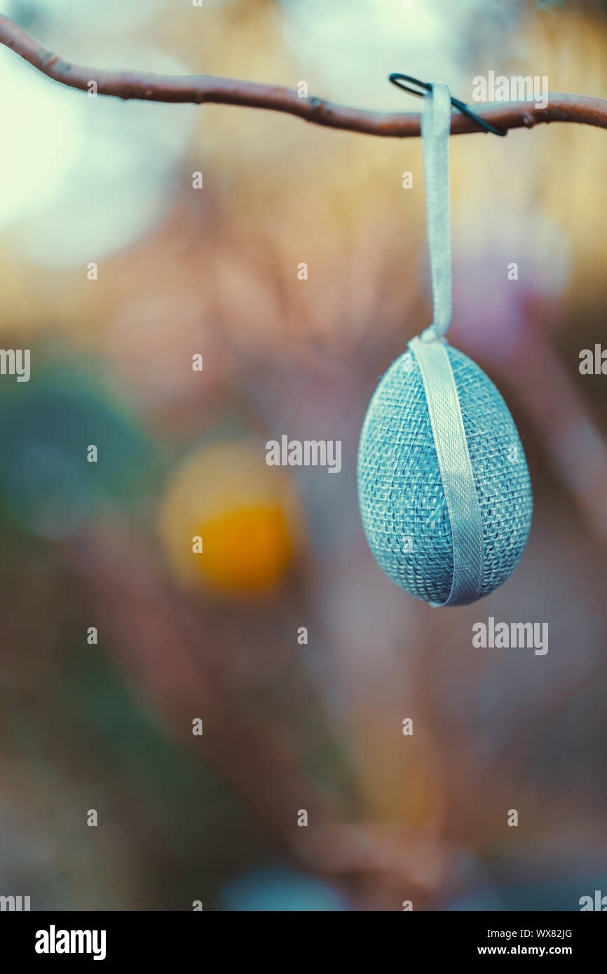 Easter eggs on tree with bokeh Stock Photo