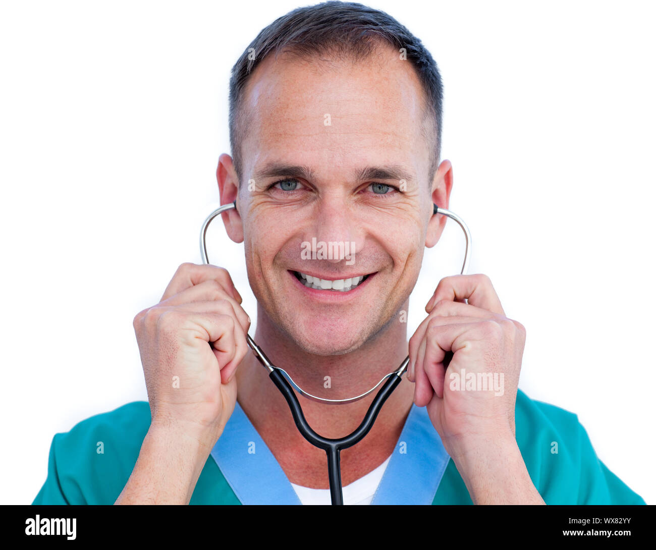 Portrait of a handsome male doctor holding a stethoscope against a ...