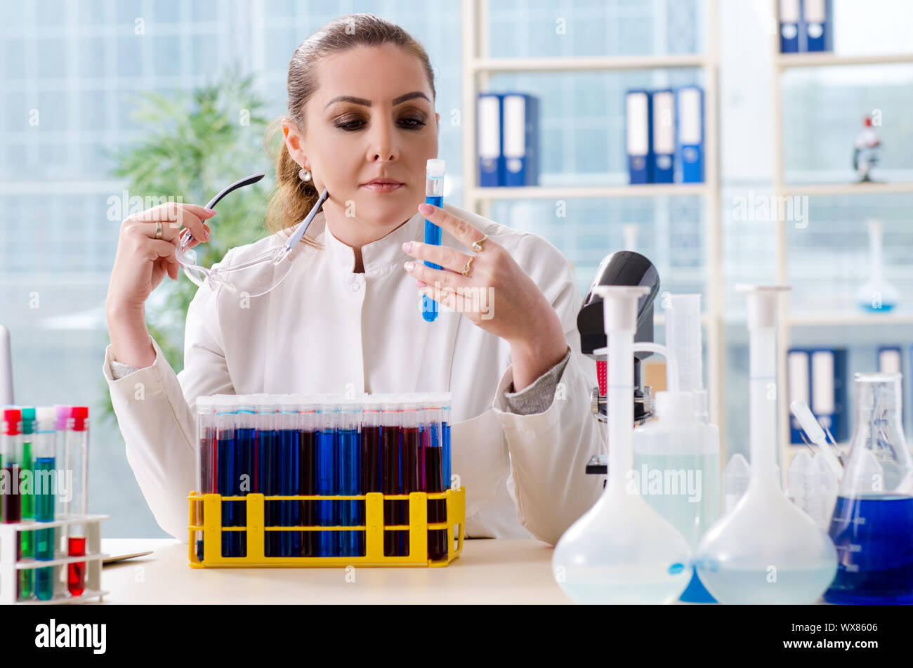 Female chemist working in medical lab Stock Photo