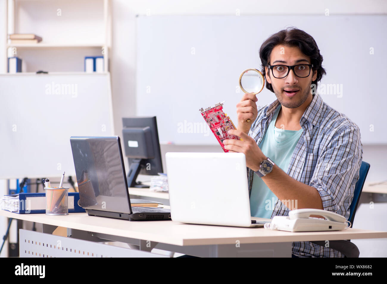 It specialist working in the office Stock Photo