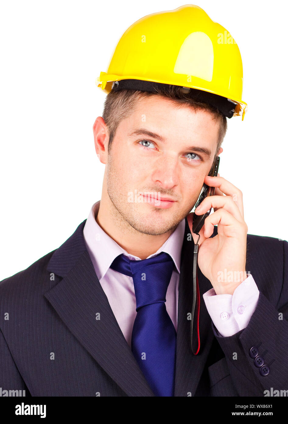Young Construction worker talking on the phone Stock Photo