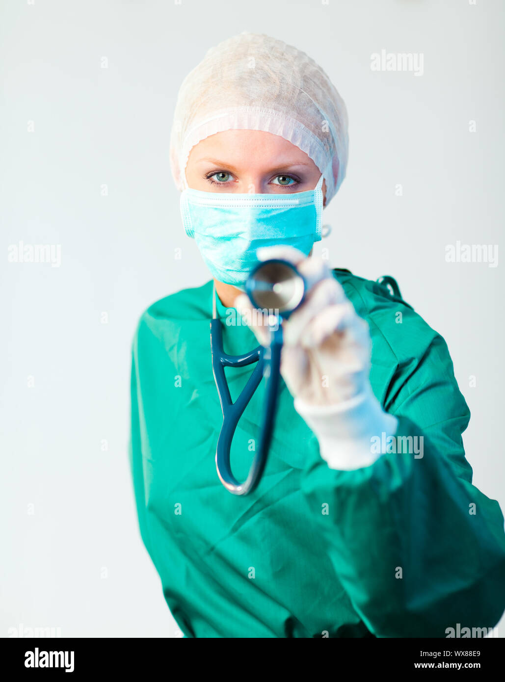 Young female Surgeon holding stethescope outwards Stock Photo Alamy