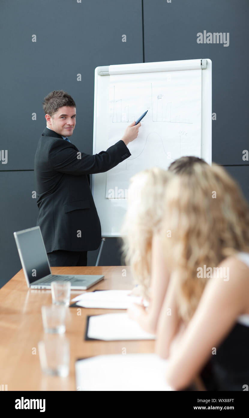 Business teamwork With man giving presentation Stock Photo