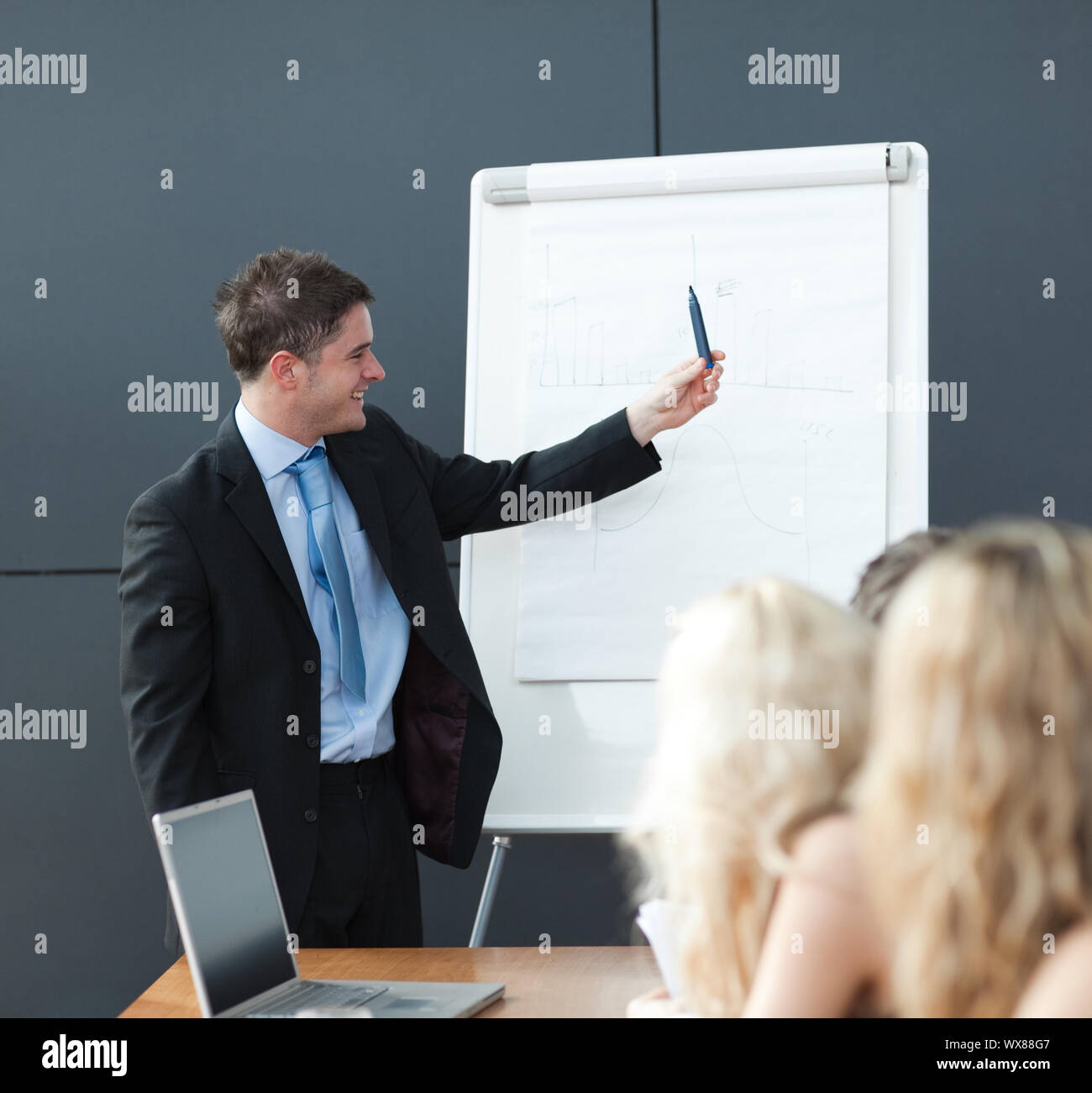 Business teamwork With man giving presentation Stock Photo