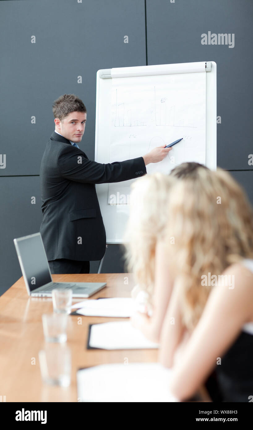 Business teamwork With man giving presentation Stock Photo