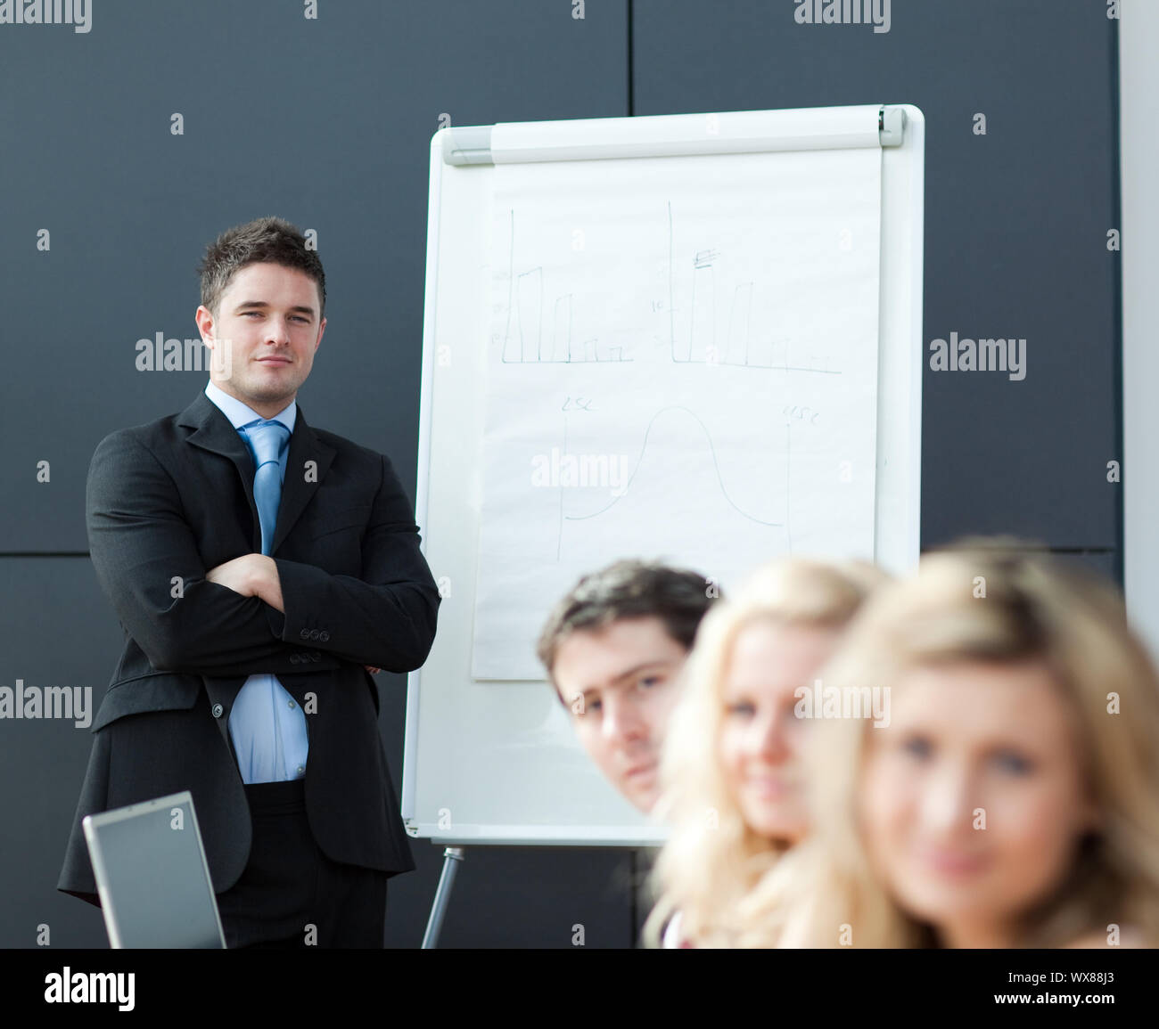 Business teamwork With man giving presentation Stock Photo