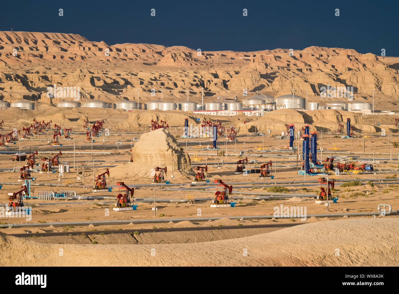 gobi oil field at dusk Stock Photo