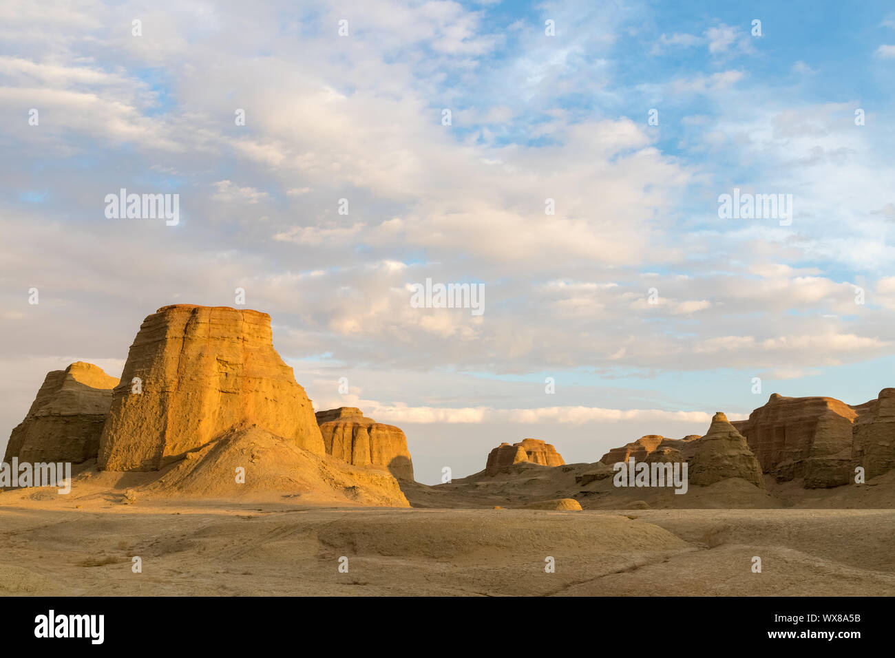 beautiful xinjiang ghost city in sunset Stock Photo - Alamy