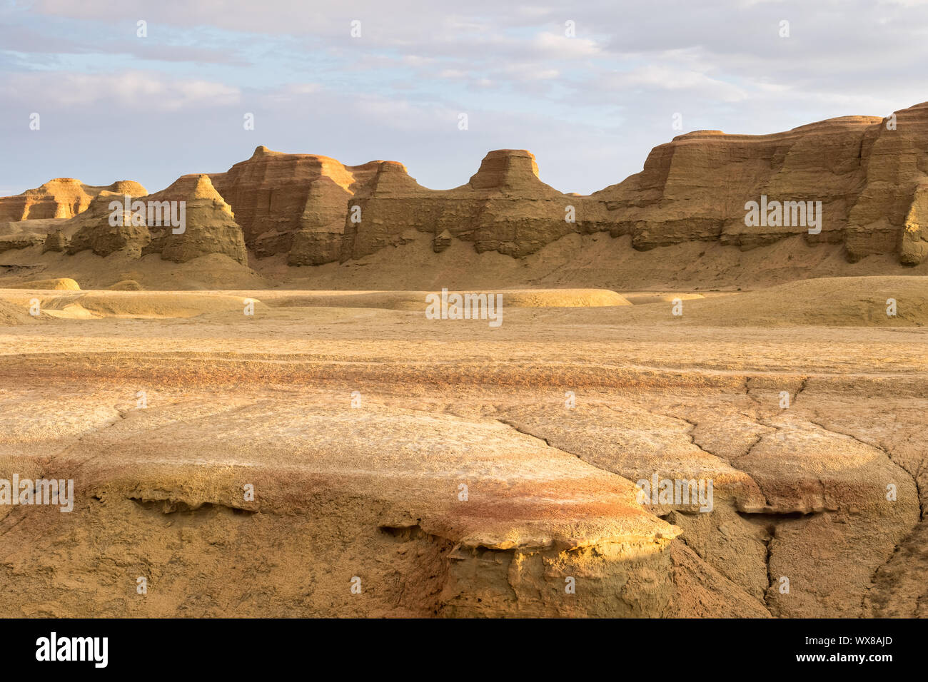 wind erosion landform landscape in sunset Stock Photo