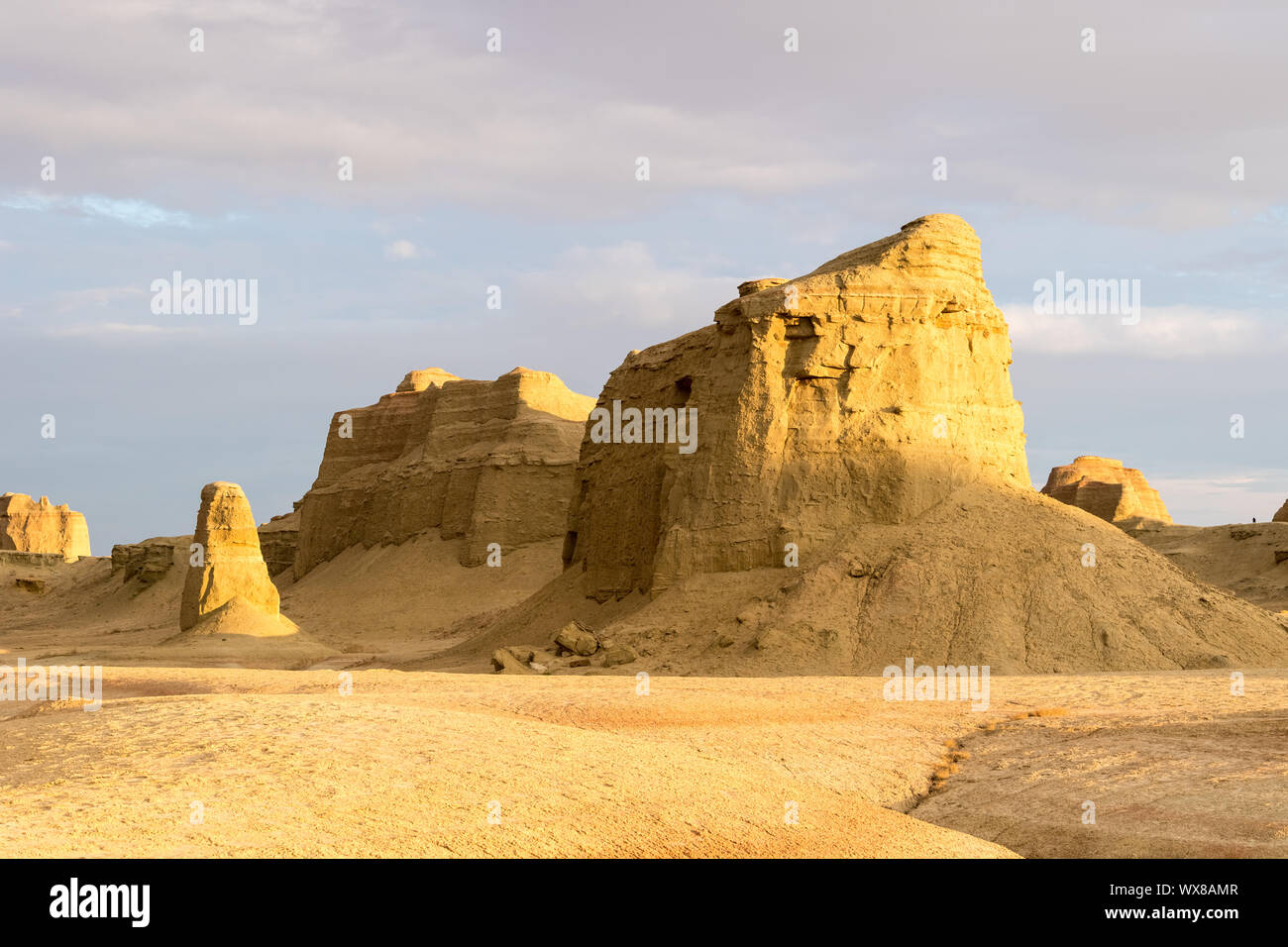 wind erosion landform landscape in sunset Stock Photo