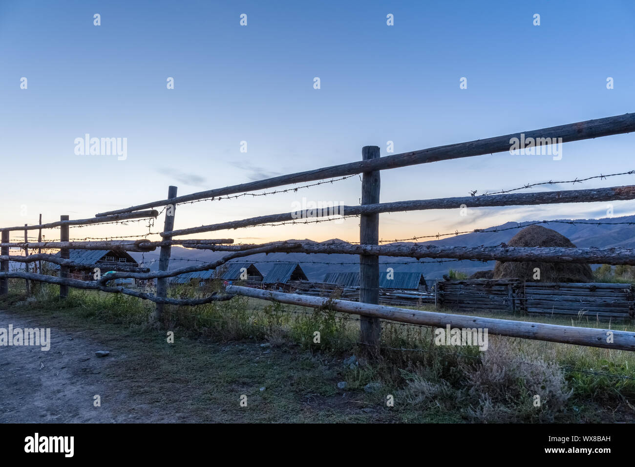 wooden fence in sunset Stock Photo