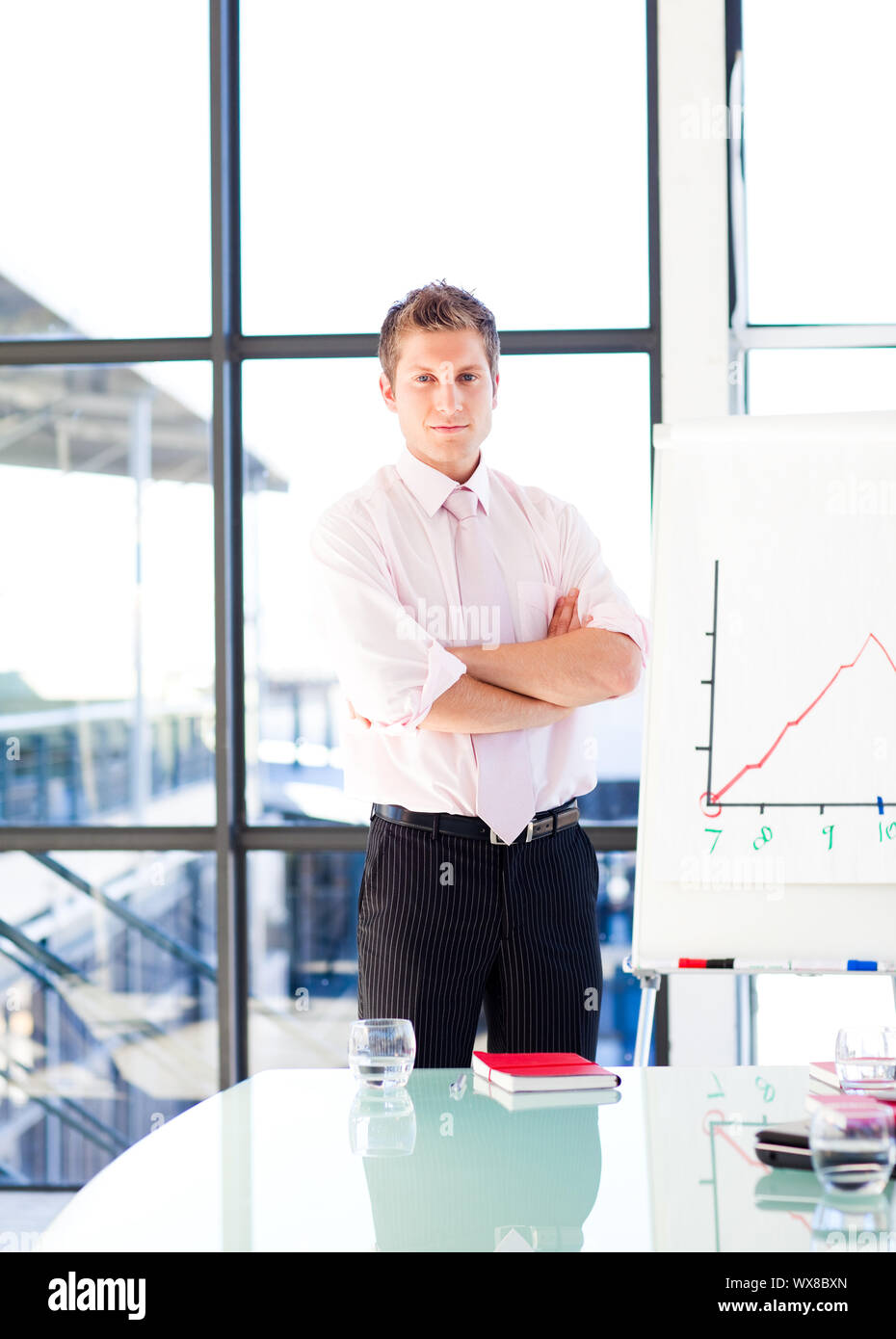 Smiling businessman giving a presentation Stock Photo