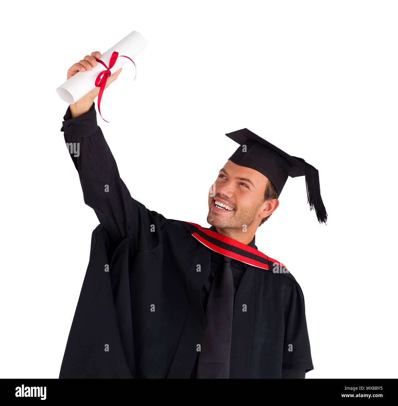 Closeup of an attractive boy celebrating his graduation Stock Photo - Alamy