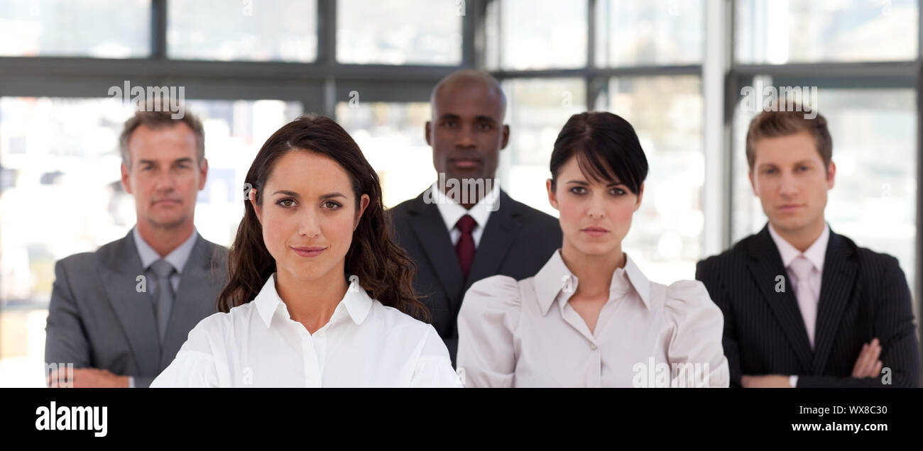 Happy business team standing together Stock Photo