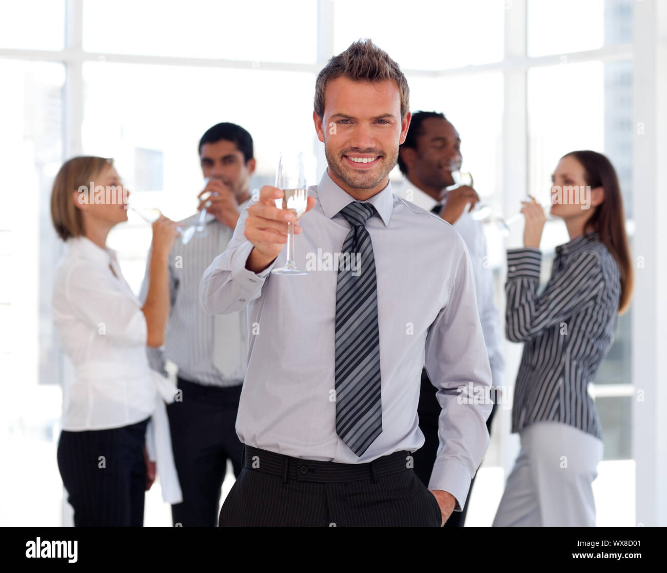 Happy Business team drinking champagne Stock Photo