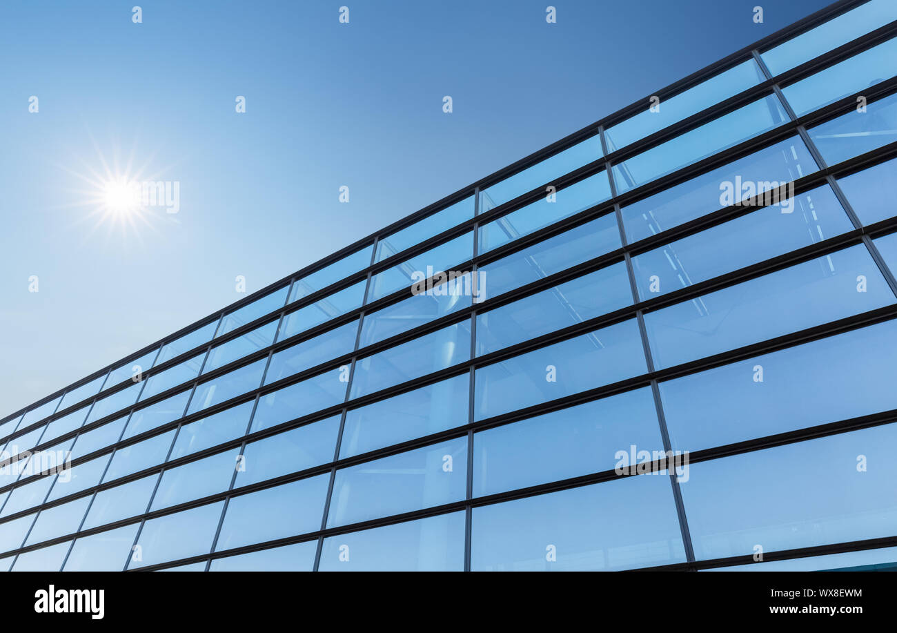 glass block screen wall and sky Stock Photo