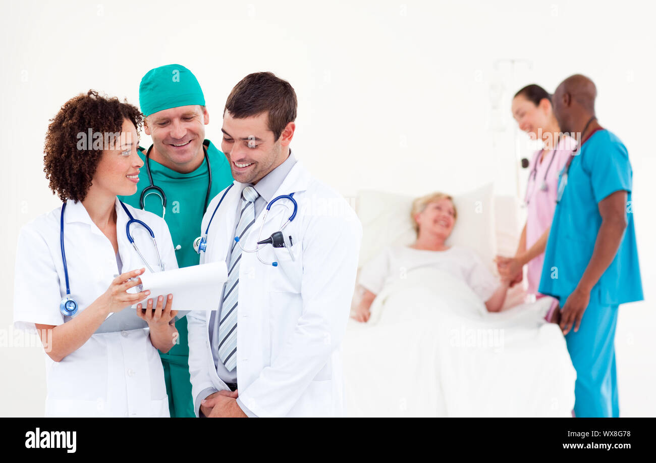 Positive doctor examining a patient Stock Photo