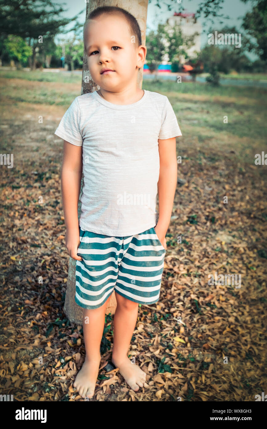 Outdoor portrait of cute little boy Stock Photo - Alamy