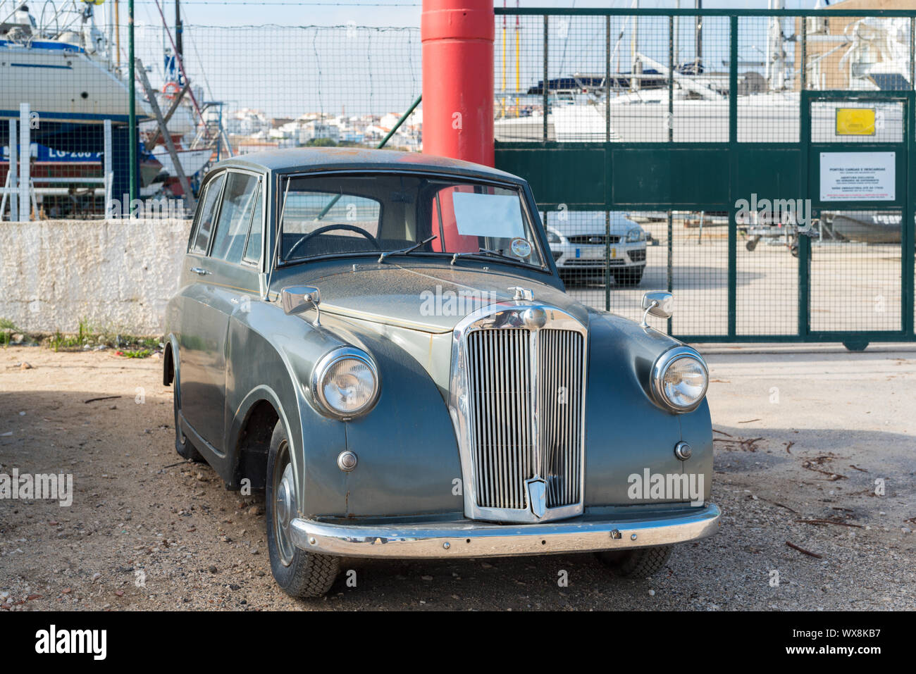 Classic car in the port of Lagos, Portugal Stock Photo Alamy