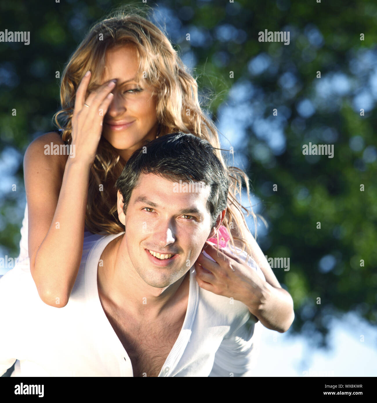 man and woman hug in the sky Stock Photo - Alamy
