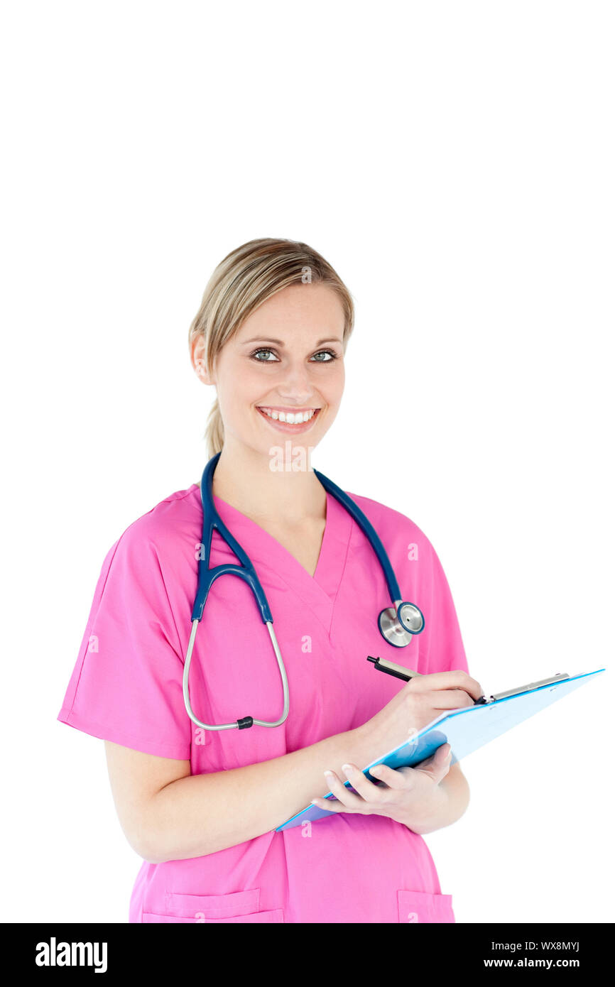 Smiling nurse looking in the camera holding a clipboard Stock Photo - Alamy