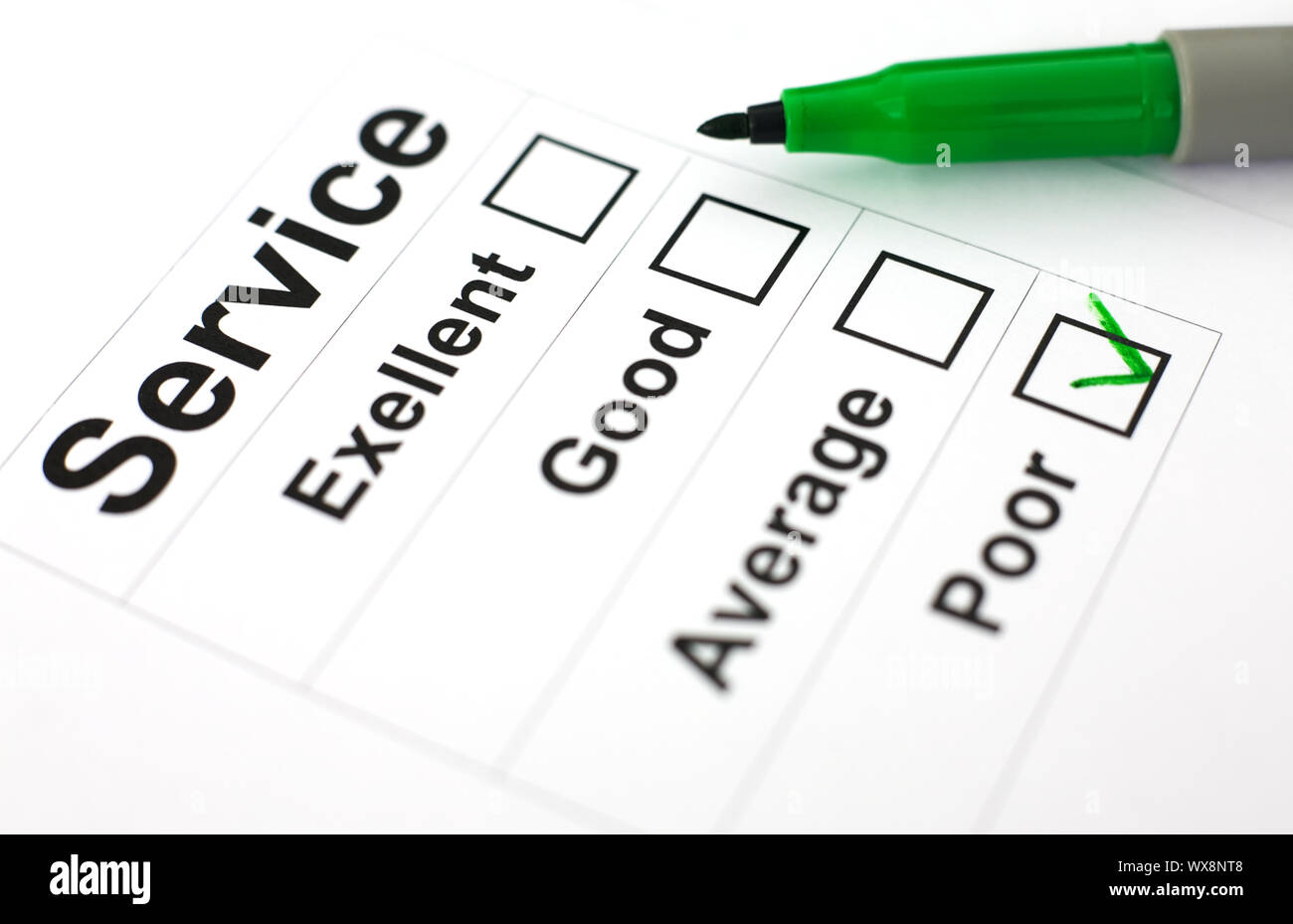 Questionnaire and green marker on the white background Stock Photo - Alamy