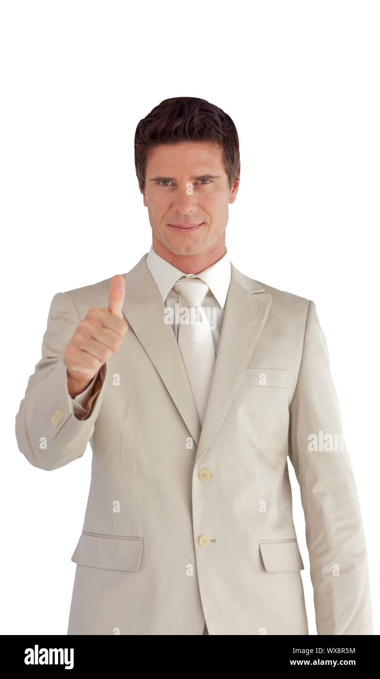 Confident businessman making a thumb-up isolated on a white background ...