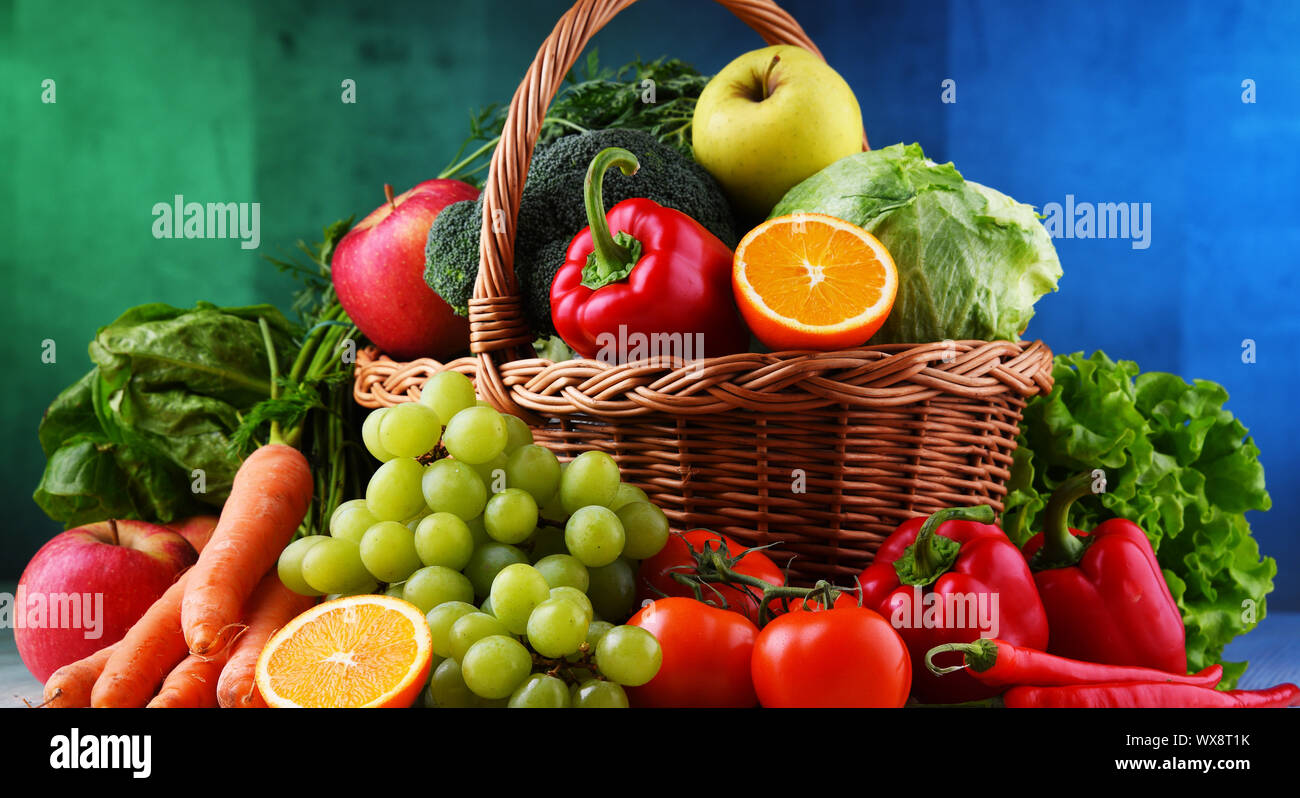 Fresh organic fruits and vegetables in wicker basket Stock Photo - Alamy