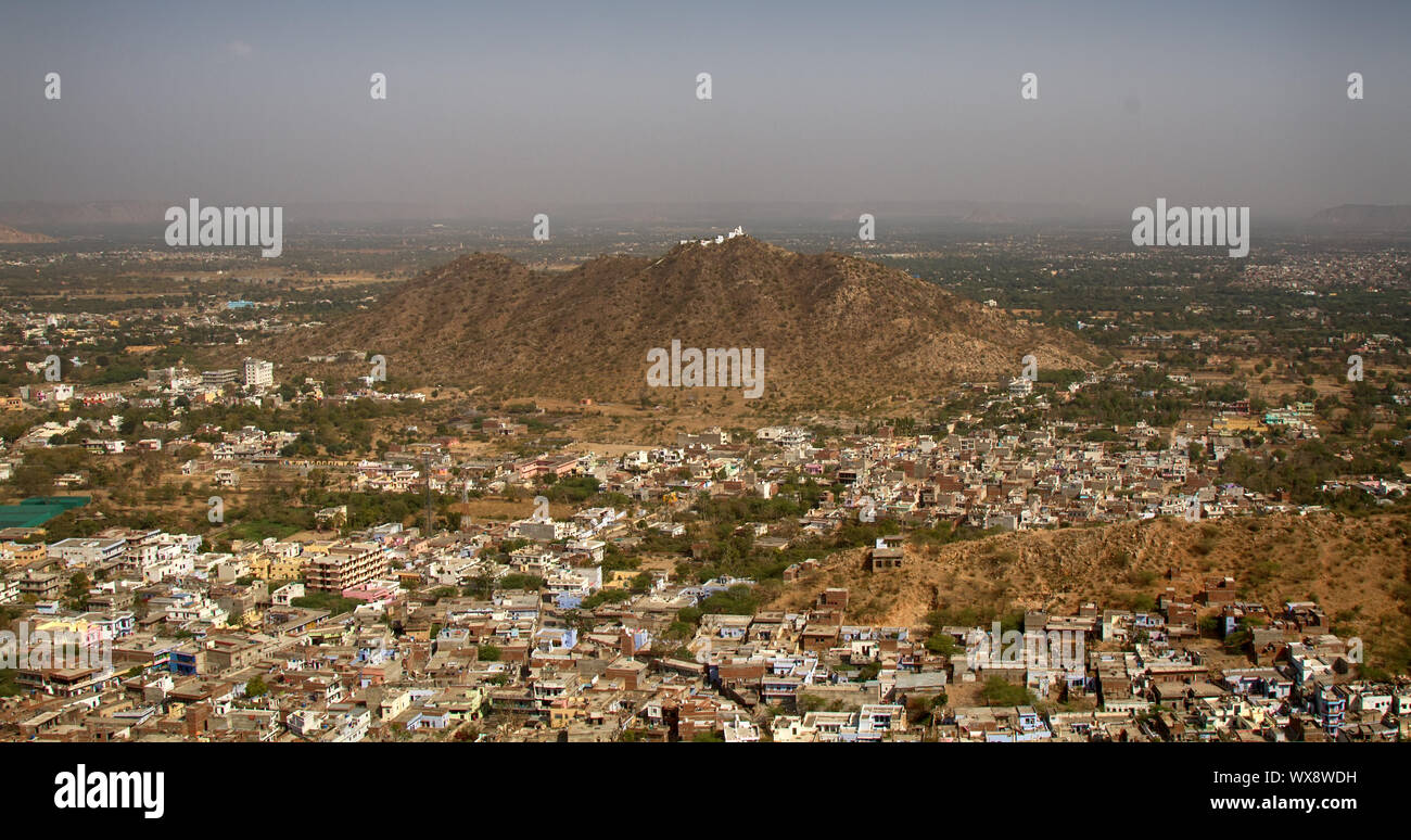 Indian Cities of different sizes cover earth's surface to horizon Stock Photo