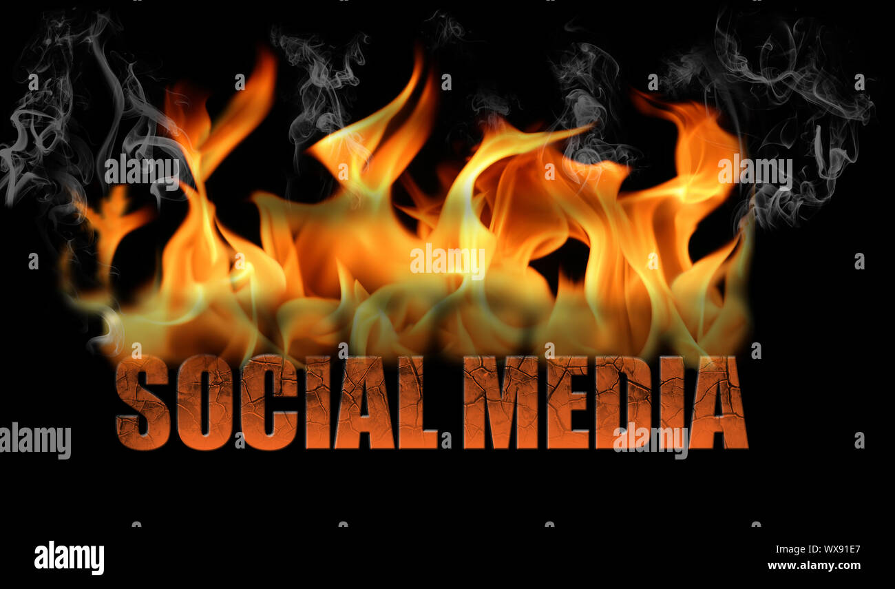 This is the words social media in flames, with fire and smoke and steam  coming off. It is horizontal on a black background Stock Photo - Alamy