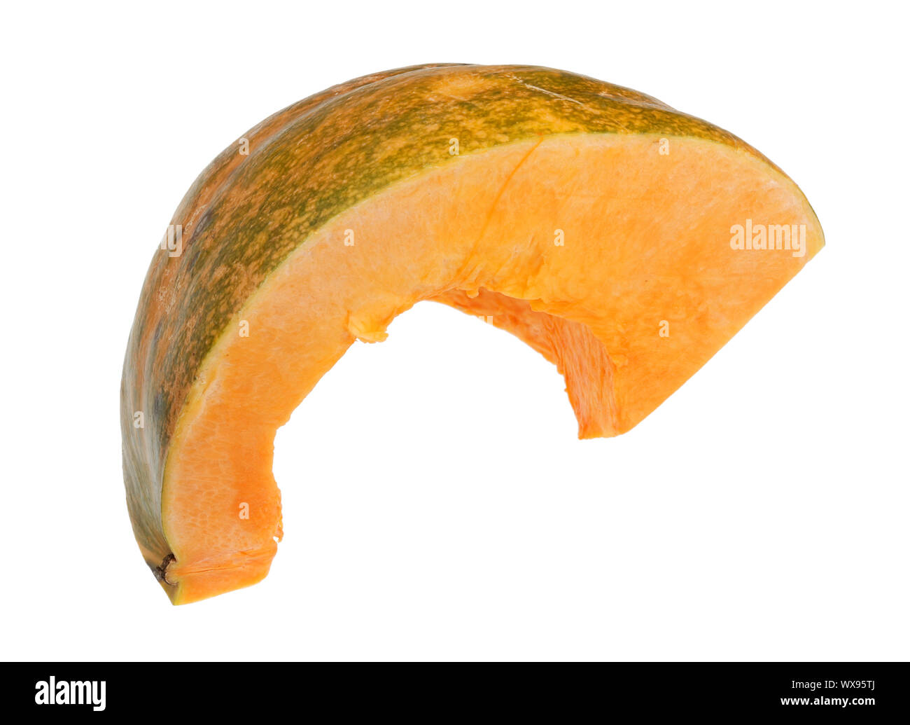 Piece  of ripe orange pumpkin with green skin isolated Stock Photo