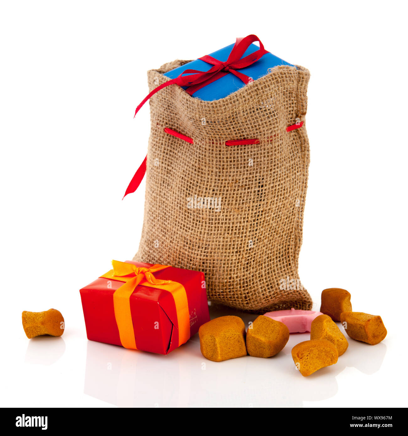 Bag Dutch Sinterklaas presents and pepernoten Stock Photo - Alamy