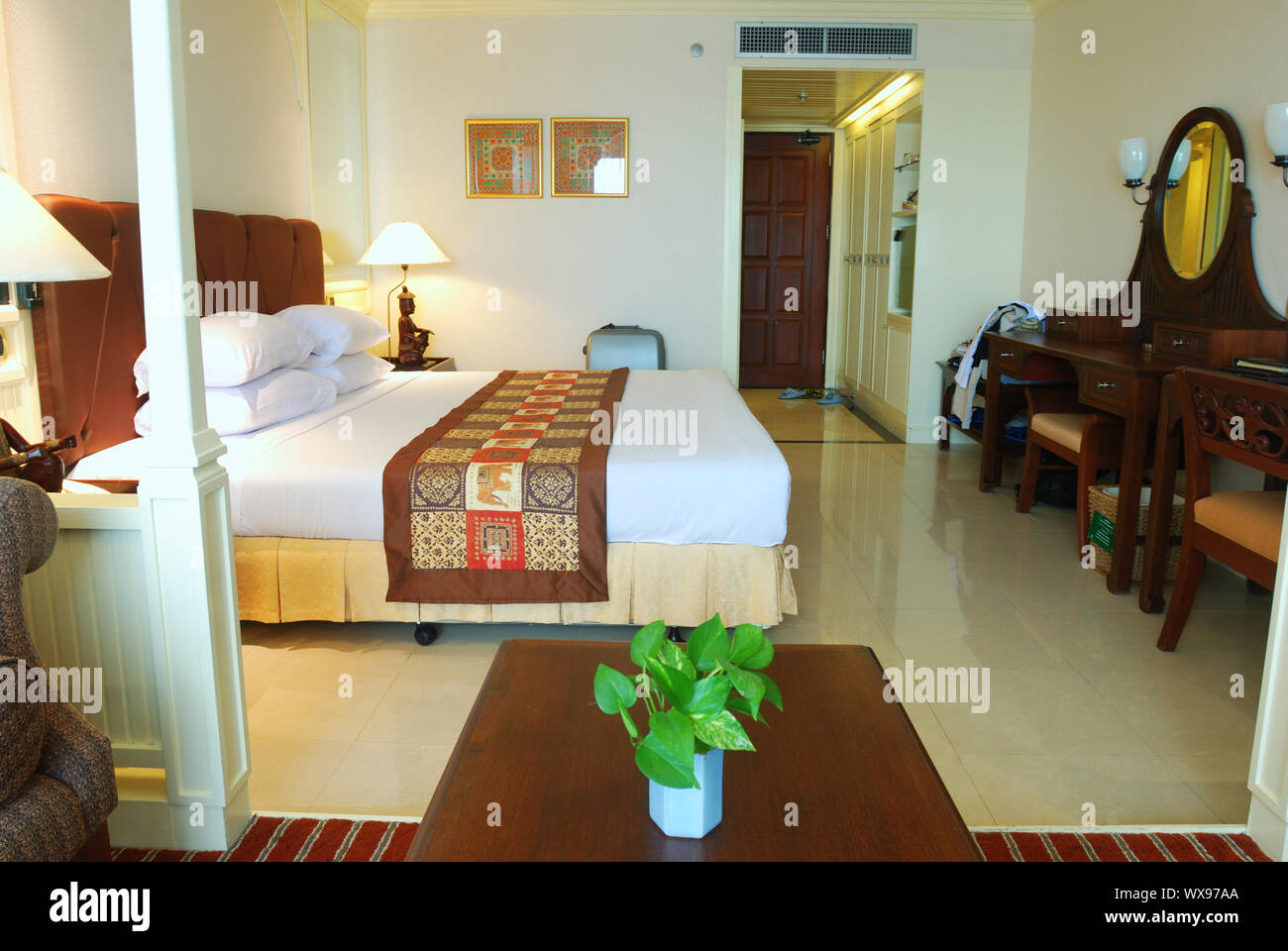Luxurious Hotel Room Interior With King Size Bed Stock Photo