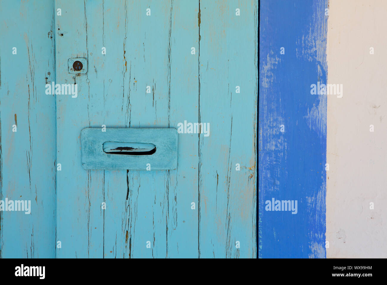 Blue and turquoise mediterranean door in Ibiza formentera Stock Photo -  Alamy