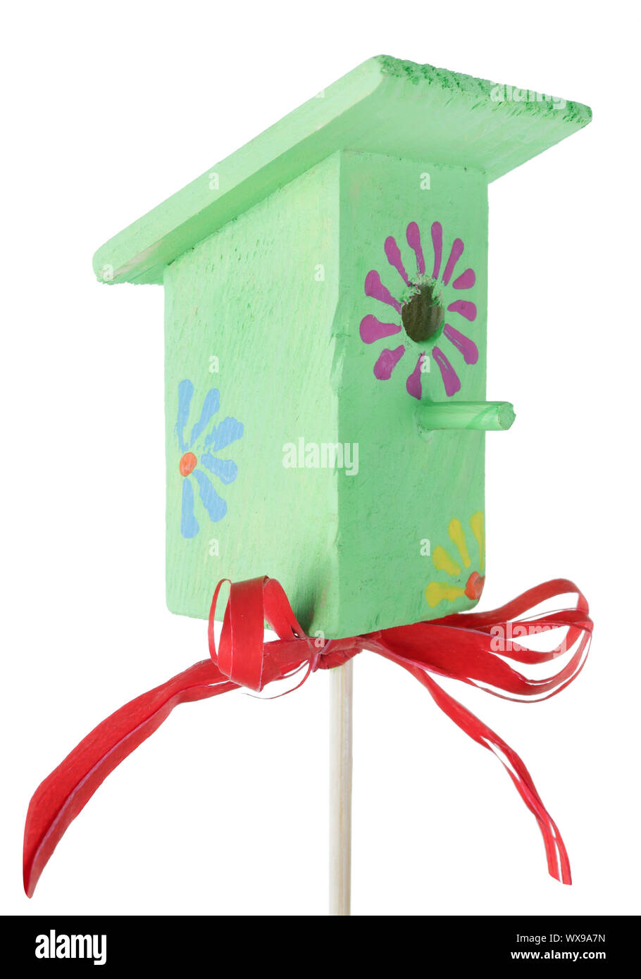 Multicolored  homemade wooden  small  birdhouse  isolated Stock Photo