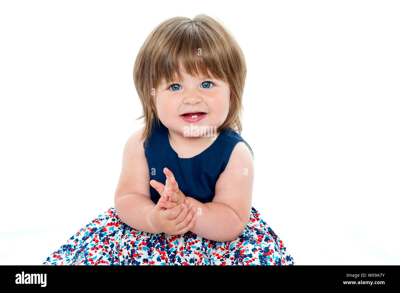 chubby little girl Beautiful pretty chubby little girl. Studio shot Stock Photo - Alamy