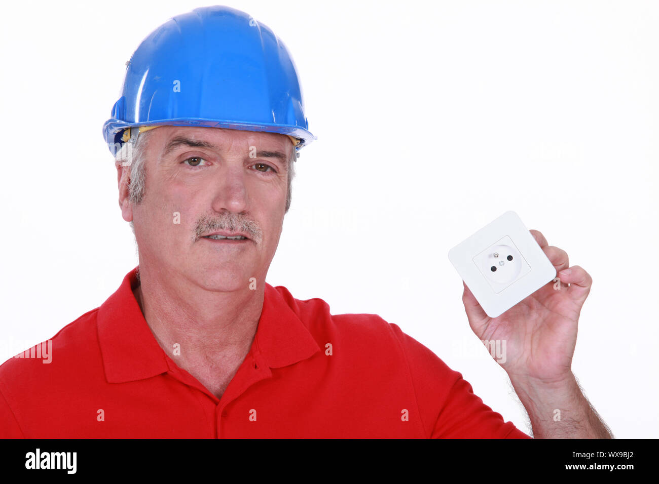 Builder with a continental power socket Stock Photo