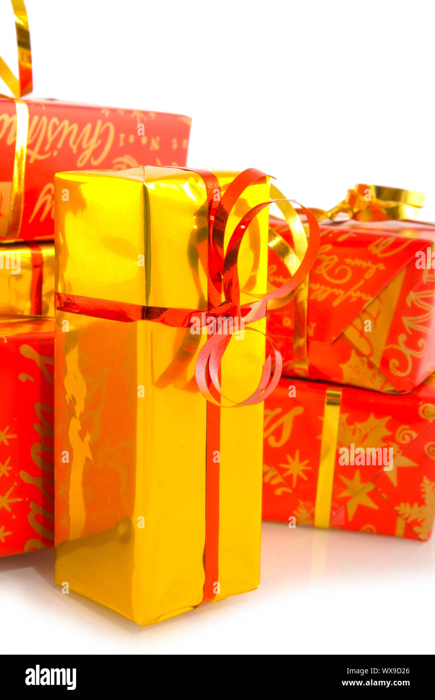 Red and golden christmas presents wrapped with luxury paper Stock Photo - Alamy