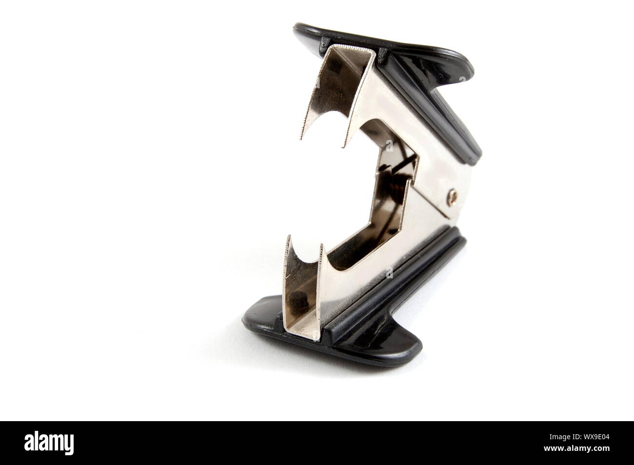 Staple remover isolated on a white background. Stock Photo