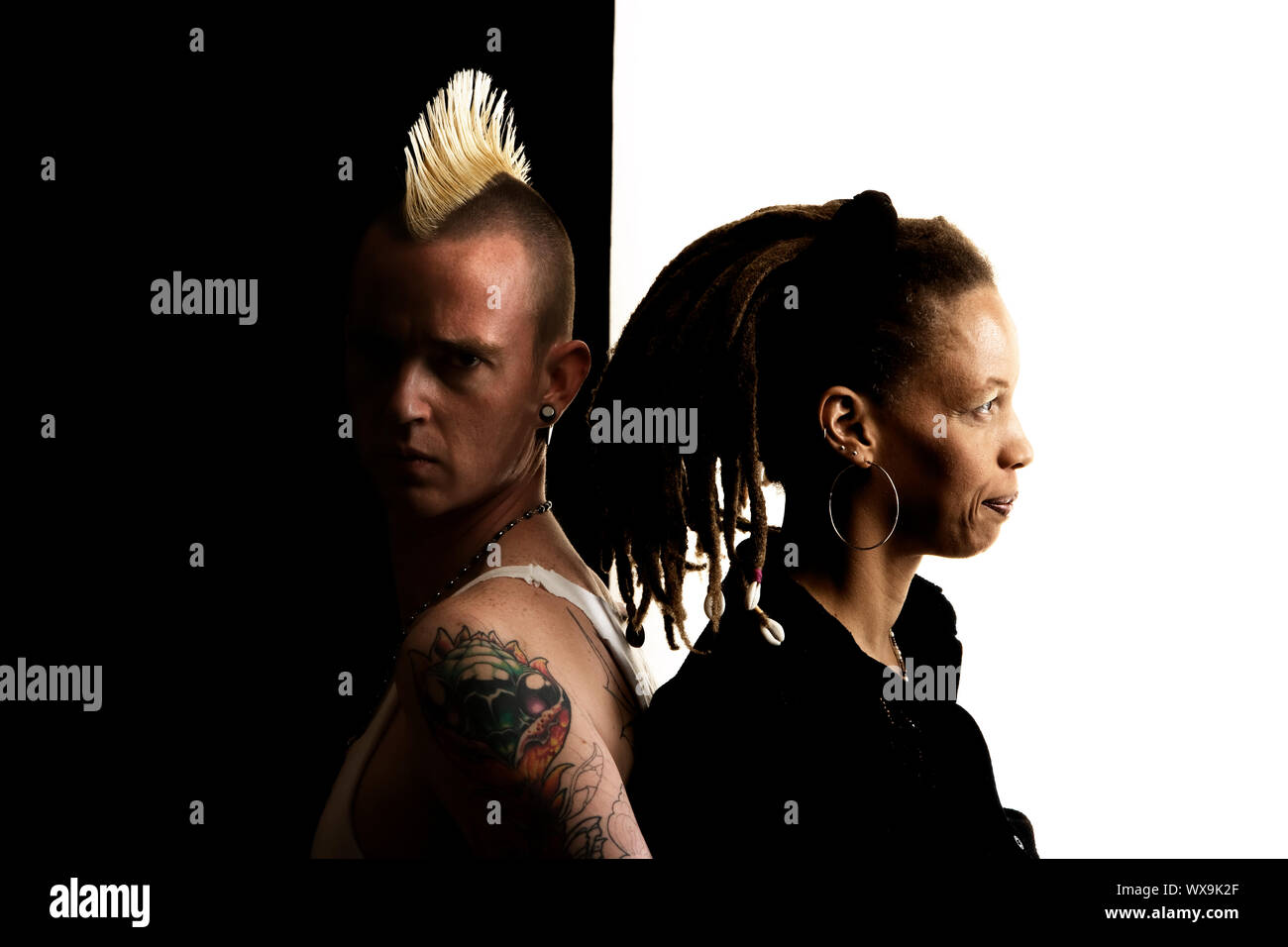 Caucasian Man With Mohawk And African American Woman With