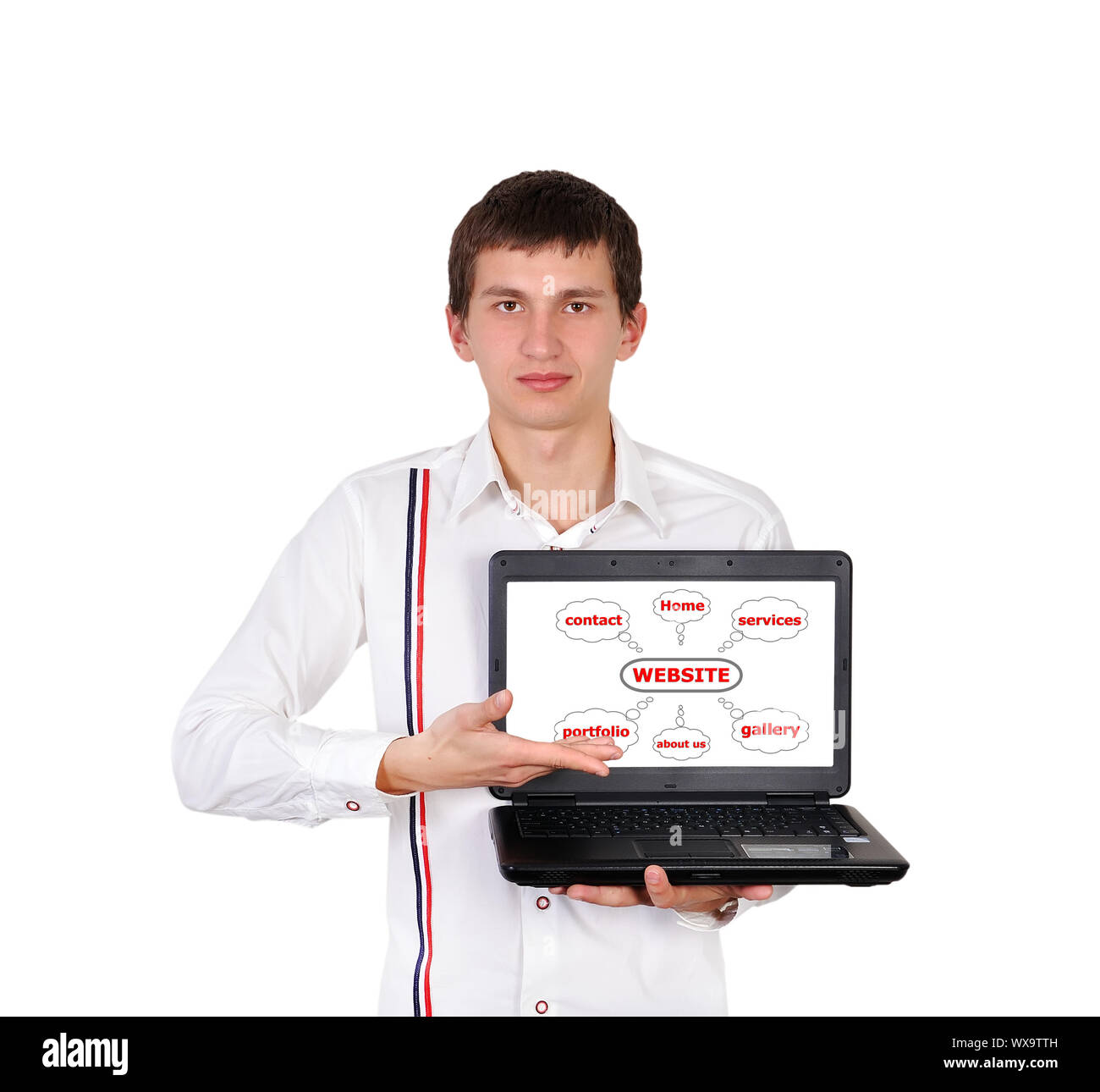 man with a laptop in hand points to scheme website Stock Photo