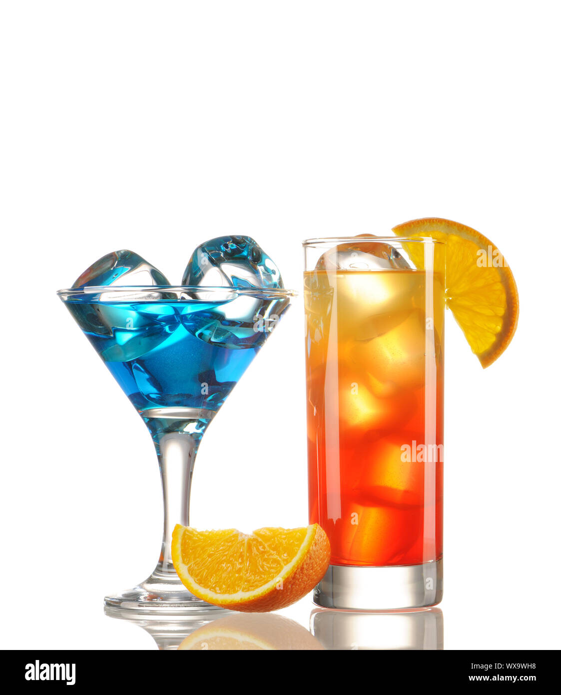 Tequila Sunrise and Blue Curacao cocktail isolated on white Stock Photo
