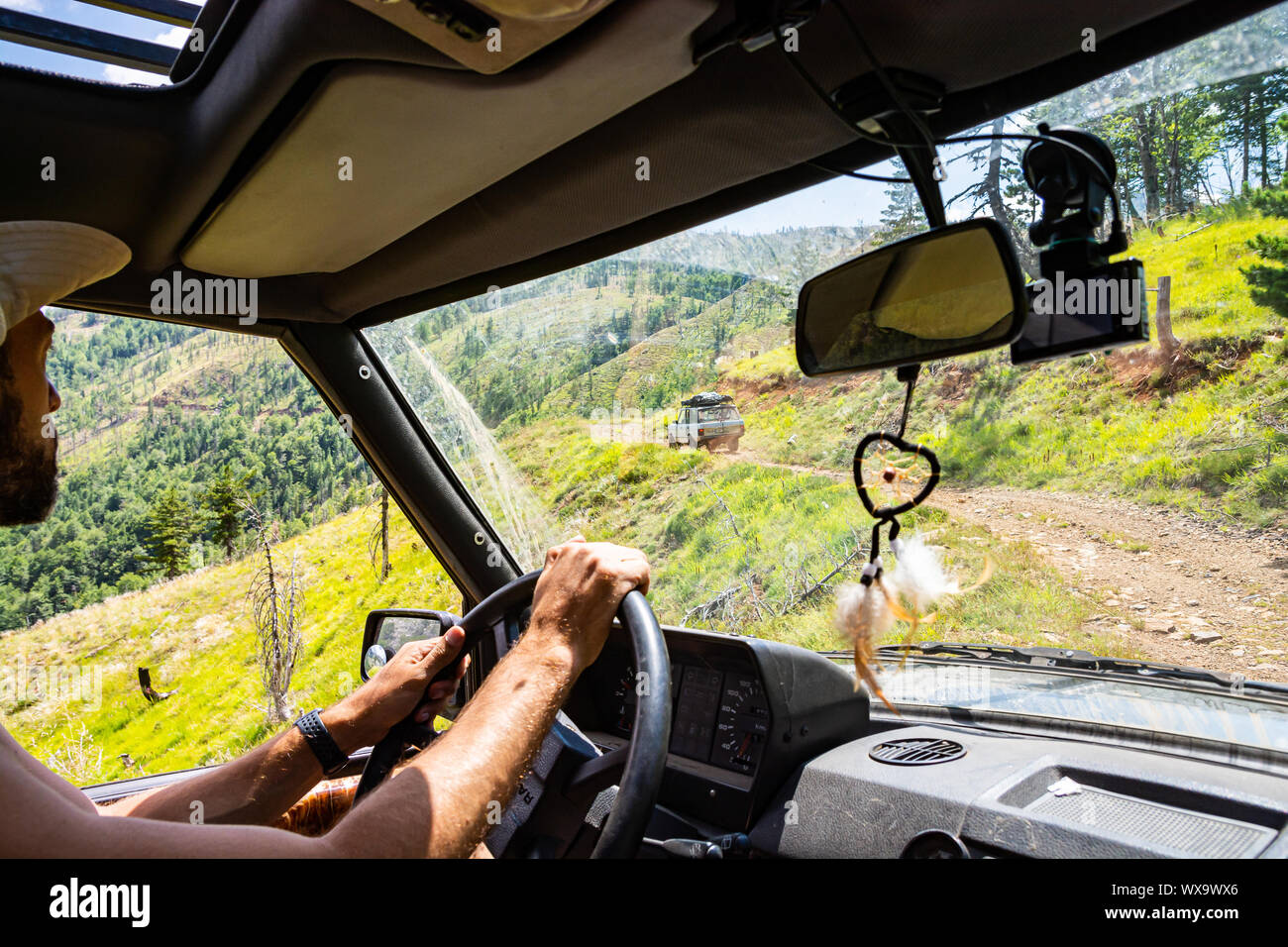 Fushe Lure, Albania - July 26, 2019. Off road car going through the National Park Lure in summer Stock Photo
