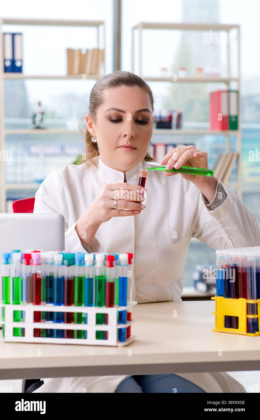 Female chemist working in medical lab Stock Photo Alamy