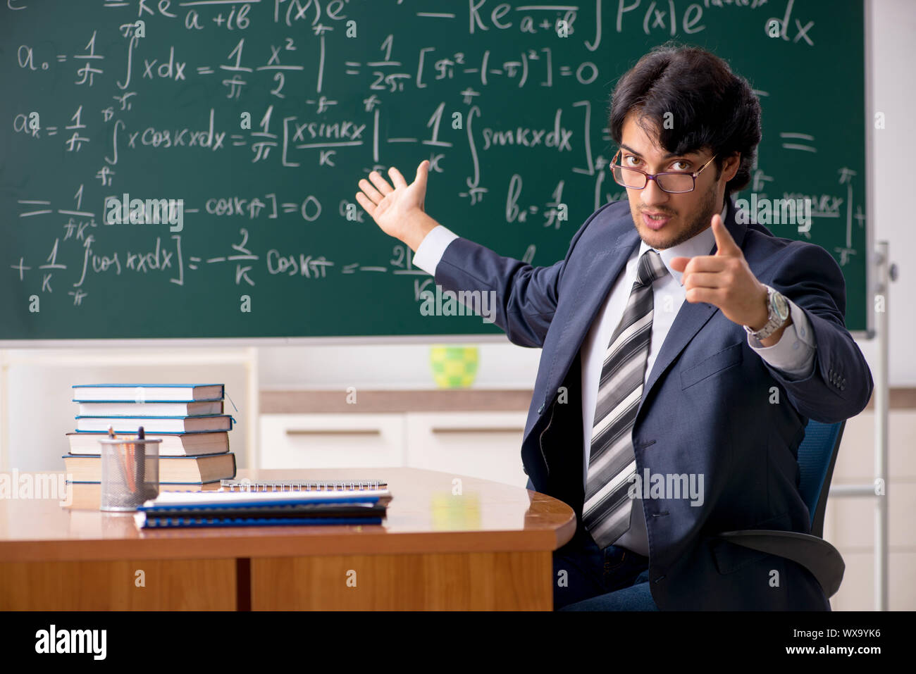 Male teacher presenting school test hi-res stock photography and images ...