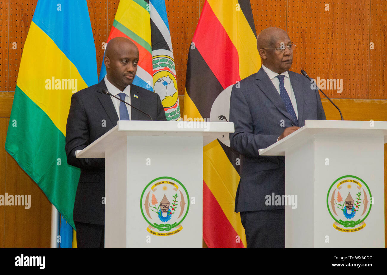 (190916) -- KIGALI, Sept. 16, 2019 (Xinhua) -- Ugandan Foreign Minister Sam Kutesa (R) and Rwandan Minister of State in Charge of East African Affairs Olivier Nduhungirehe attend a joint press conference after the first meeting of the ad hoc commission of the memorandum of understanding (MoU) signed in August to cease hostilities between Uganda and Rwanda, in Kigali, capital of Rwanda, on Sept. 16, 2019. Rwanda and Uganda on Monday reiterated their commitment to refraining any act of destabilization against each other following deliberations at the first meeting of the ad hoc commission of the Stock Photo