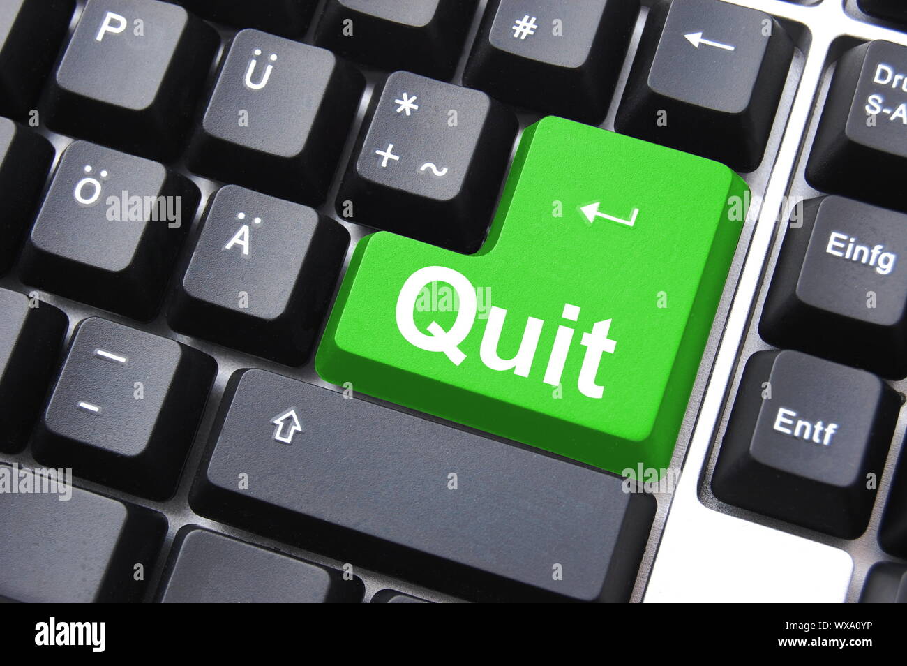 quit button on black internet computer keyboard Stock Photo