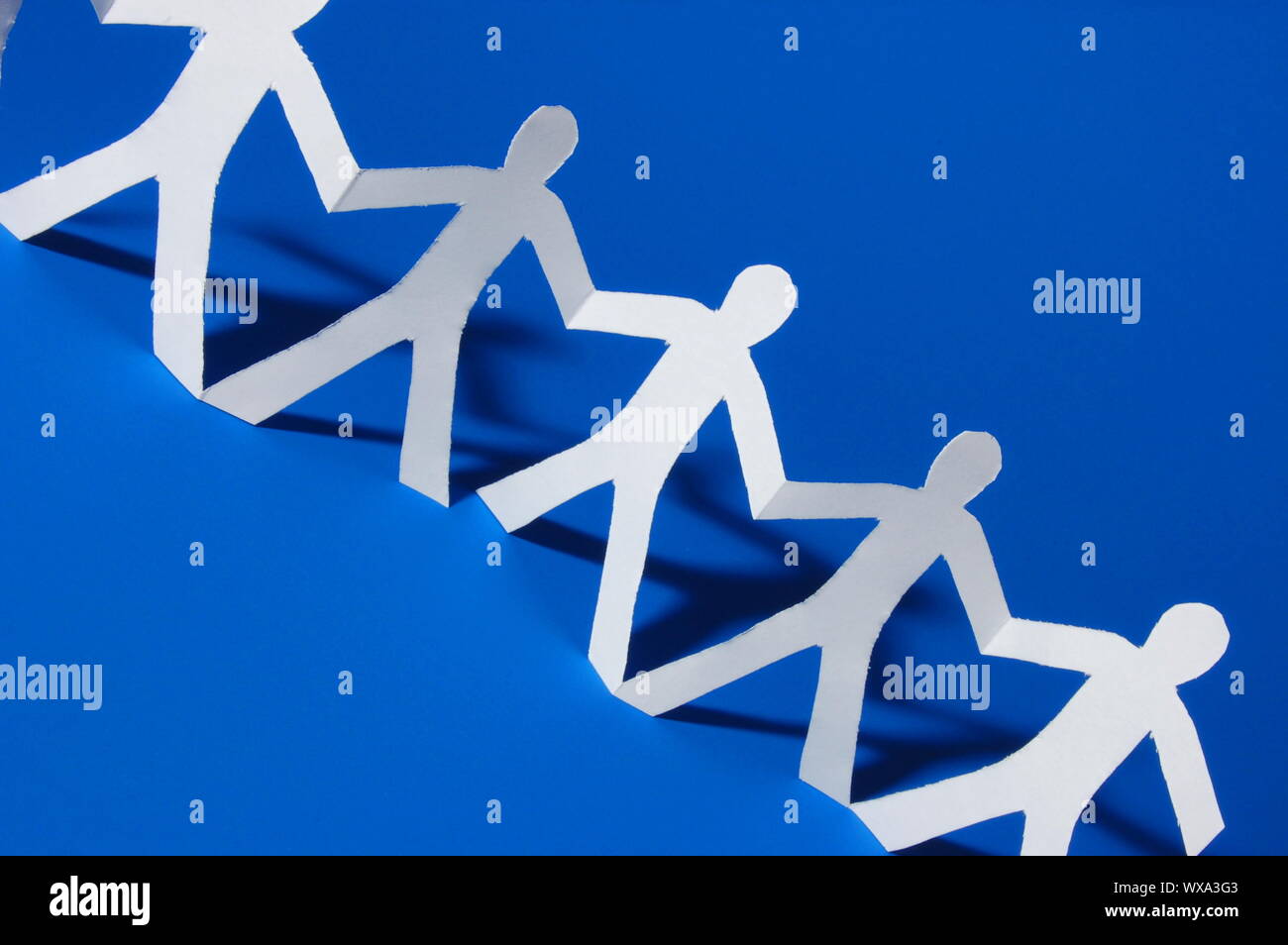 team of paper people having a party Stock Photo Alamy