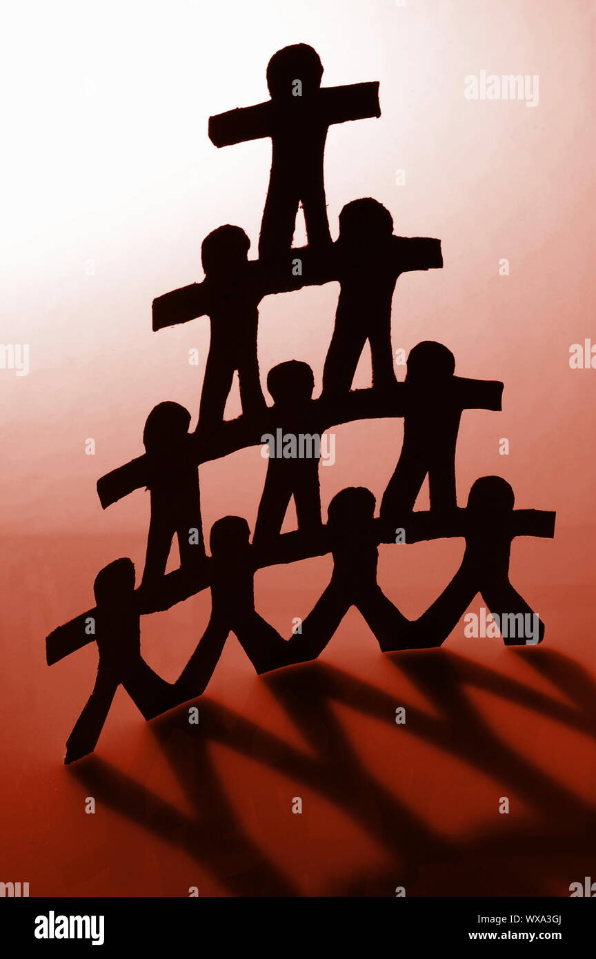 team of paper man showing concept of teamwork Stock Photo Alamy
